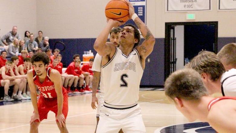 Penn State DuBois senior forward Ashton Fortson prepares to release a free throw during a home basketball game at the PAW Center against Grove City College.